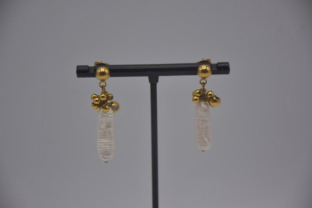 Boucle d’oreille en éclat baroque