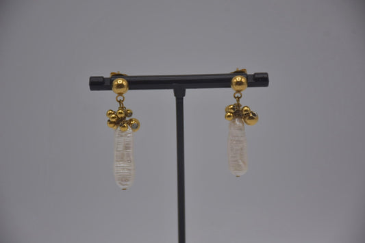 Boucle d’oreille en éclat baroque