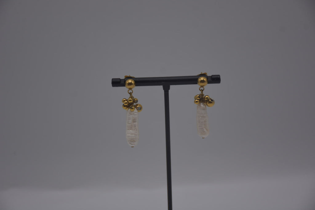 Boucle d’oreille en éclat baroque