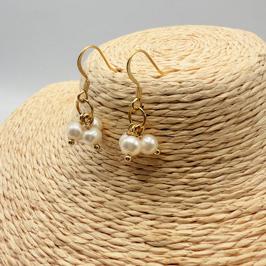 Boucle d’oreille trois perles